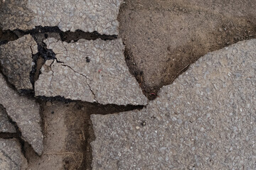 Selective focus background image of broken asphalt,  road work theme
