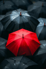 Vivid red umbrella standing out among black umbrellas during a rainy day, symbolizing uniqueness and individuality - AI generated