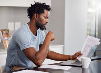 Black man, laptop and thinking in kitchen for budget, planning and savings account for personal...