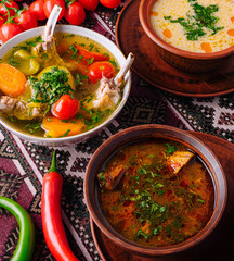 Traditional homemade soup served in earthenware bowls