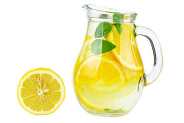 Glass jug with lemon water (or alcohol), slices and mint isolated on white background