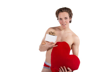 A young attractive guy in the role of Cupid with gifts. Valentine's Day.