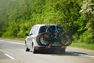 Car is transporting bicycles on the roof