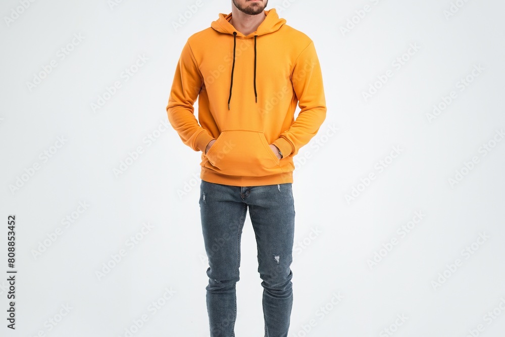 Wall mural Fashionable Man Poses in Blank Hoodie for Logo Mockup - Wall murals