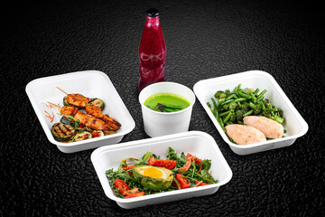 A variety of healthy and delicious meal options packed in eco-friendly containers for a convenient and sustainable way to eat.