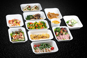 A variety of healthy and delicious meal options packed in eco-friendly containers for a convenient and sustainable way to eat.