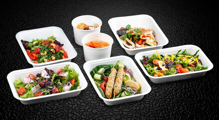 A variety of healthy and delicious meal options packed in eco-friendly containers for a convenient and sustainable way to eat.