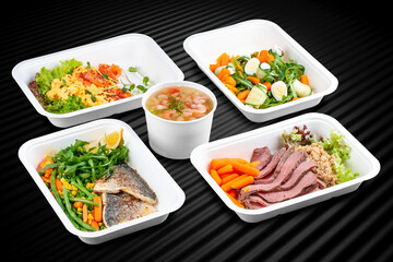 A variety of healthy and delicious meal options packed in eco-friendly containers for a convenient and sustainable way to eat.