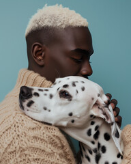 Elegant Affection: Portrait of fashion black man and  Dalmatian dog on blue background. Minimal animal concept.
