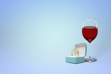 Wine glass with ring box and engagement ring