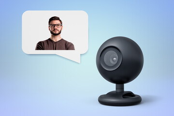 Man in a chat bubble and webcam on blue backdrop