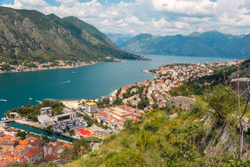 Panoramic view of Boko Kotor Bay and old town. Landscape with beautiful mountains, sea and clouds....