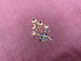 Blue and red silk thread with golden aari floral butti on linen fabric