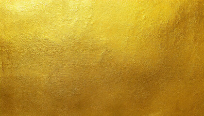Gold wall texture background. Yellow shiny gold foil paint on wall sheet with gloss light reflection, vibrant golden paper luxury wallpaper