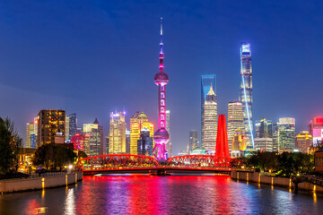 Shanghai skyline at Bund with Oriental Pearl Tower downtown at night in China