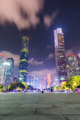 Guangzhou Canton skyline cityscape with skyscrapers in downtown at night portrait format in...