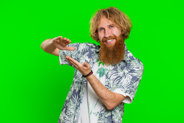 Young man showing wasting throwing sharing money around, more tips, big profit, winning lottery jackpot, successful shopping payment purchase cashback. Redhead guy isolated on chroma key background
