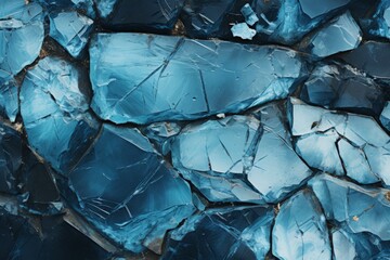 Abstract image showcasing the intricate details and patterns of cracked ice with varying shades of blue and white, resembling a frozen landscape or a natural ice mosaic