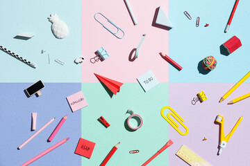 School supplies on colorful background
