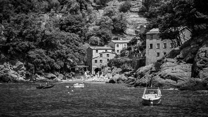 Magic of Liguria. Timeless images. Ancient abbey of San Fruttuoso, bay and historic building guarded by the FAI. Italian Environmental Fund. Black and white.