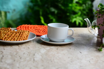 O café é uma bebida produzida a partir dos grãos torrados do fruto do cafeeiro. É servido...