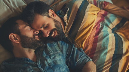 Gay couple cuddling in bed Stock Photo photography