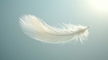 Single White Feather Floating Gracefully Against a Soft Blue Sky Background