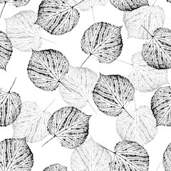 Seamless background with falling tree leaves on white. Ink prints of leaf skeleton. For fabric, cover, packaging, wrapping, wallpaper.