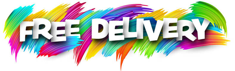 Free delivery paper word sign with colorful spectrum paint brush strokes over white.