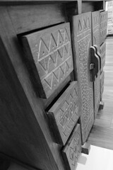 Black And White Photo Of A Wooden Cabinet