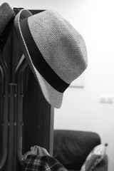 Black And White Photo A Fedora Hat Hanged At The Hanger