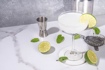 Gimlet citrus alcohol cocktail. Sweet and sour boozy alcoholic drink, with gin or vodka and lime...