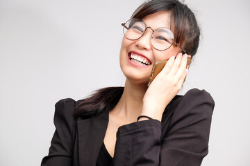 Business asian glasses women use cellphone
