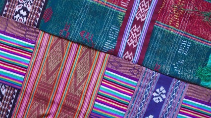 Various pattern handmade woven fabric from Indonesia, multicolor geometric textured textile background