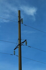 A pole with wires and wires