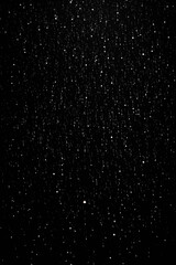 Obraz premium Illustration on a dark background, raindrops on a dark background. Unusual picture.