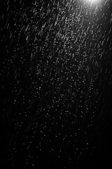 Illustration on a dark background, raindrops on a dark background. Unusual picture.