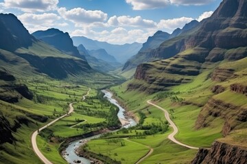 Fototapeta premium Lesotho landscape. Breathtaking Aerial View of Serpentine River through Green Mountain Valley.