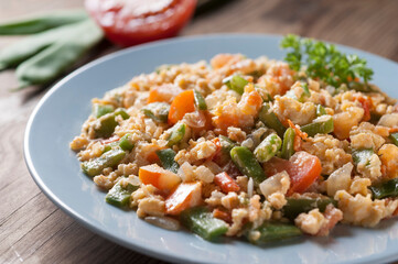 scrambled tomatoes and vegetables