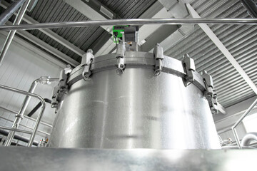 Round copper storage tanks for beer fermentation and maturation. Brew manufacturing