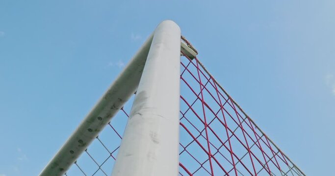 Soccer field impressions - Scoring a goal - Handheld slow-mo low-angle tracking shot