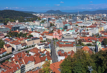 Obraz premium Ljubljana, Slovenia. High angle view over the central and north-west parts of the city with Franciscan Church of the Annunciation in the centre of the image.