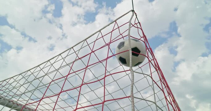 Soccer field impressions - Scoring a goal - Handheld slow-mo, filmed from behind the goal