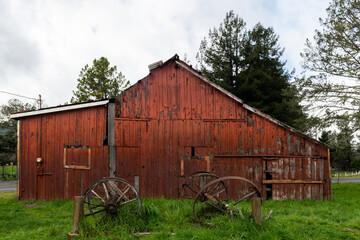 Dilapidated, old, red, wooden barn shack in rural northern California.