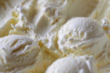 Close-up image of creamy vanilla ice cream scoops, perfect for summer refreshment themes and National Ice Cream Day promotions