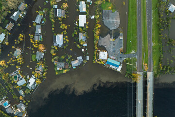 Heavy flood with high water surrounding residential houses after hurricane Ian rainfall in Florida...