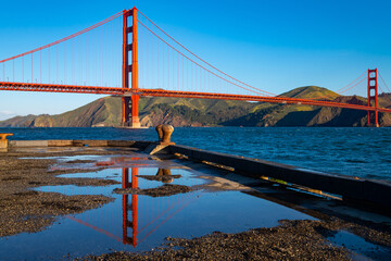 Iconic Golden Gate bridge seen from “Torpedo wharf“ in Crissy Field, San Francisco (USA) on a...