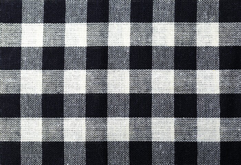 Detail of a black and white checkered fabric.