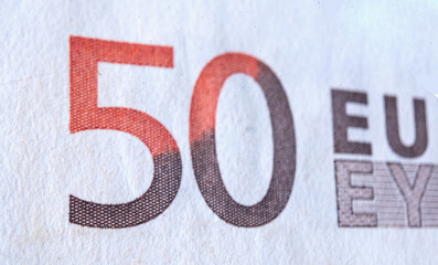 Close up fragment of 50 Euro description on banknote