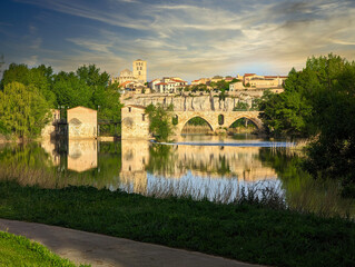 Zamora old town seen form Douro river, Acenas and stone bridge in the foreground, Cathedral in...